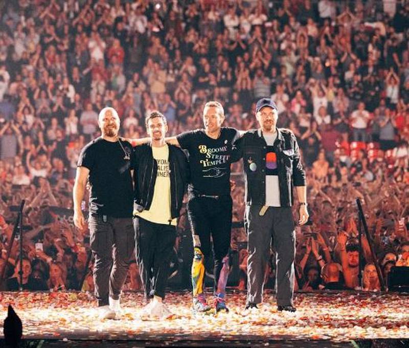 La banda Coldplay en una foto de su concierto en el estadio Wembley, en Londres.
