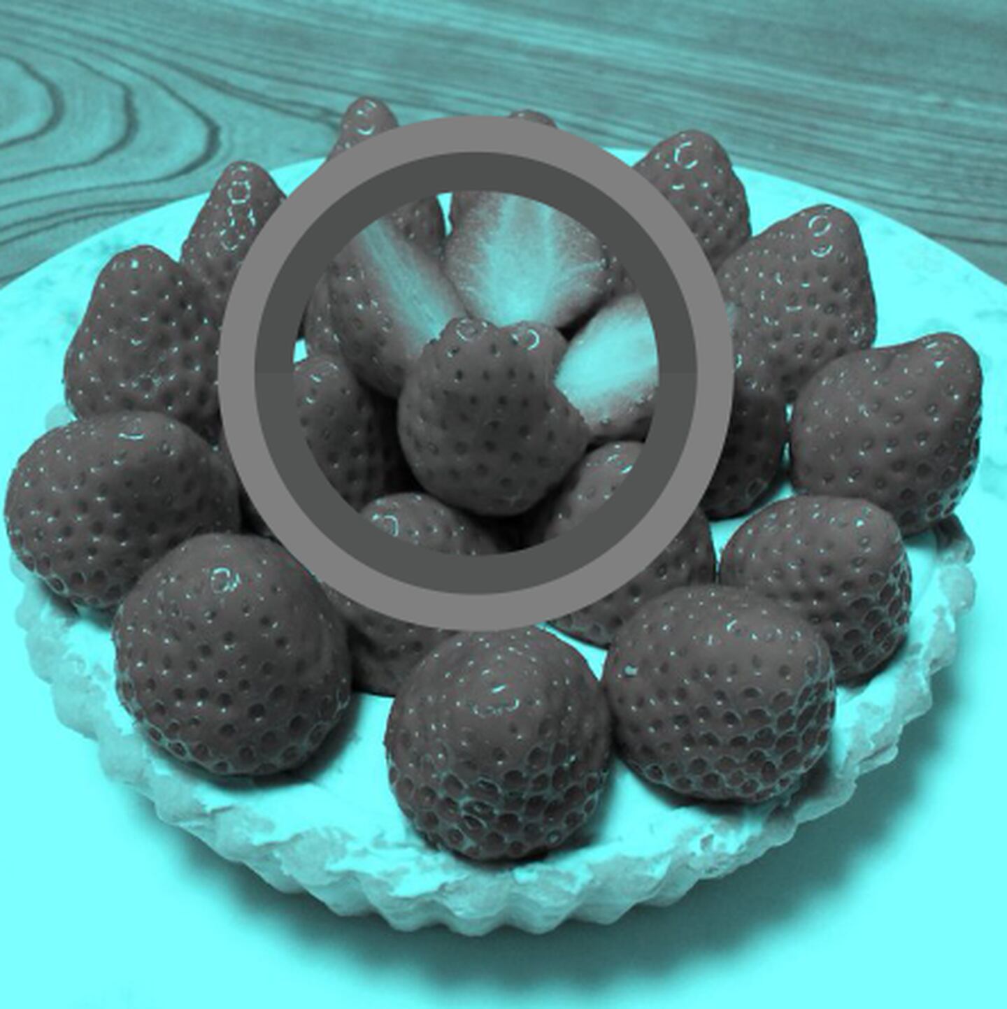 Con la herramienta "gotero" de Photoshop se puede comprobar que las fresas en la imagen son grises