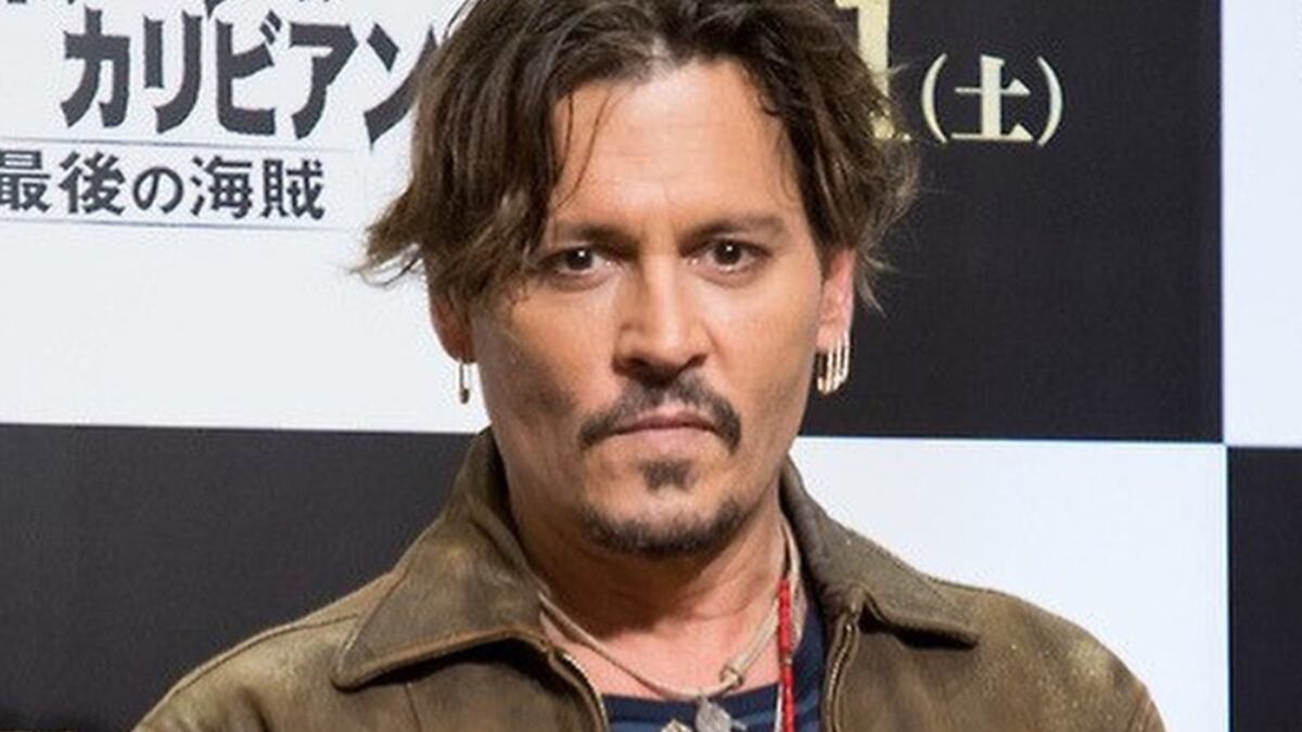 Johnny Depp posa en la alfombra roja